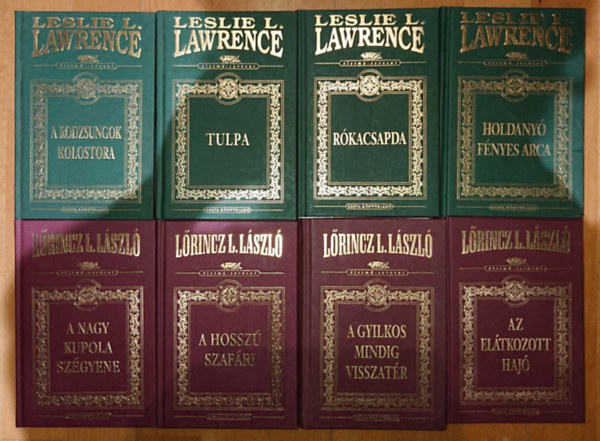 8 kötet Leslie L. Lawrence díszkiadásos sorozatából: A Rodzsungok kolostora, Tulpa, Rókacsapda, Holdanyó fényes arca, Az elátkozott hajó, A nagy kupola szégyene, A hosszú szafári, A gyilkos mindig visszatér