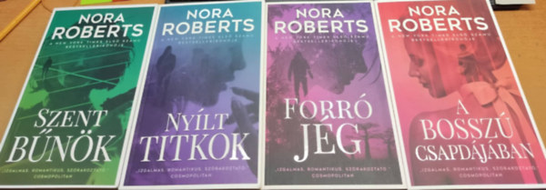 4 db Nora Roberts: Szent bnk + Nylt titkok + Forr jg + A bossz csapdjban