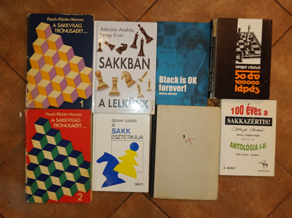 6 db k�nyv a sakk-kal kapcsolatos k�nyv �s kett� aj�nd�kba: Sakkban a lelk�nk, 100 �ves a Sakkaz�rtis!  (Antol�gia I-II.), A sakk eszt�tik�jam 50 �v - 100000 l�p�s, A sakkvi�l�g tr�nus��rt 1-2. + aj�nd�k: Black is OK forever + E