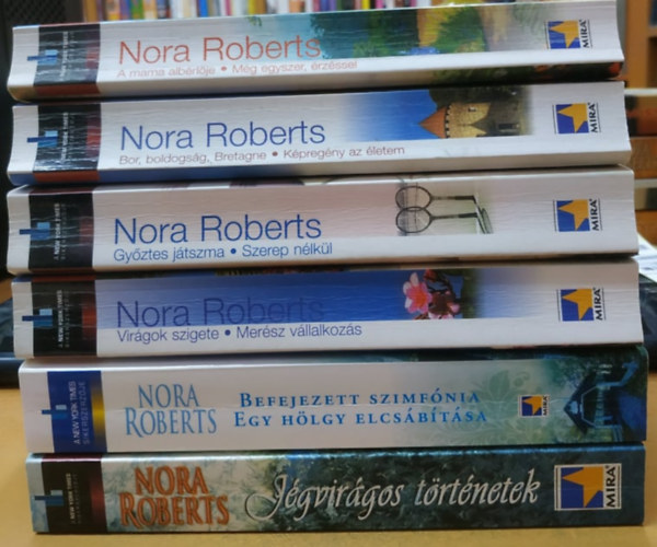 6 db Nora Roberts: A mama albrlje + Gyztes jtszma + Virgok szigete + Befejezett szimfnia + Bor, boldogsg, Bretagne + Jgvirgos trtnetek