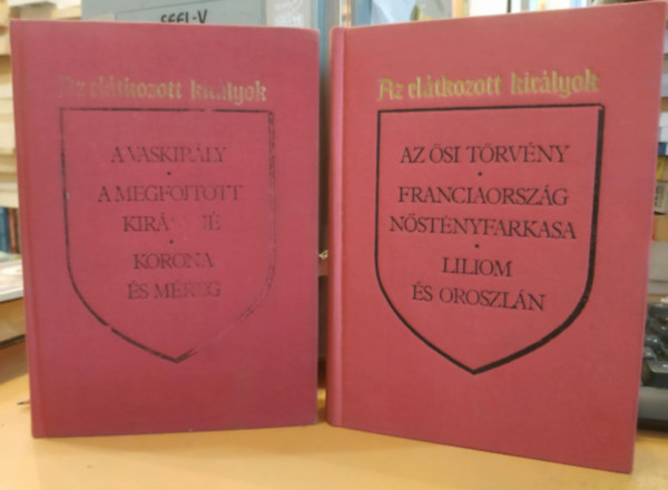 Az eltkozott kirlyok I-II. - Gyros Erzsbet fordtsban (A vaskirly, A megfojtott kirlyn, korona s mreg, Az si trvny, Franciaorszg nstnyfarkasa, liliom s oroszln (sajt kppel! szent. antikv.)