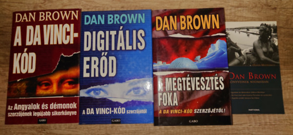 3 Dan Brown nagyreg�ny �s egy k�tet a k�nyveir�l aj�nd�kba: A Da Vinci-k�d, Digit�lis er�d, A megt�veszt�s foka + Dan Brown k�nyveinek nyom�ban