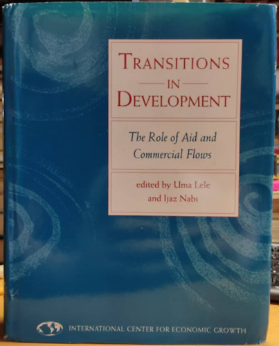 Transitions in Development: The Role of Aid and Commercial Flows