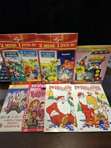 7 db mese DVD: K�p�v�rosi zsaruk, Mikul�s kalandjai 2-3., Bratz l�nyok - Var�zssz�rnyak, �zenet a j�v�b�l - A M�zga csal�d k�l�n�s kalandjai 1., 2 mese 1 DVD-n (Az �gig �r� paszuly+Aladdin),  2 mese 1 DVD-n (A h�rom musk�t�s+�z