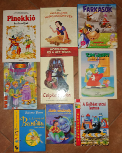 9 klasszikus, sz�nes gyerekk�nyv: Tom �s Jerry mint var�zsl�, H�feh�rke �s a h�t t�rpe, Pinokki�, A kis gyufa�rus l�ny, Csipker�zsika, Kolb�sz utcai kuyus, Piroska �s a farkas, Bambilla, Aladdin csodal�mp�ja